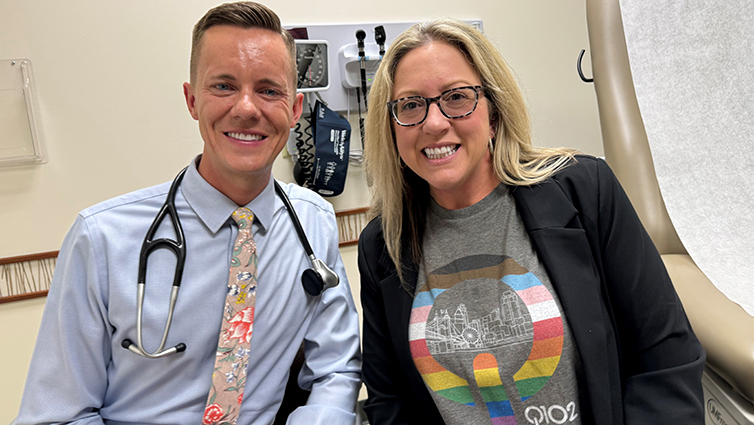 Primary Care Physician Christian Gausvik, MD, with Q102 radio personality Jennifer Fritsch